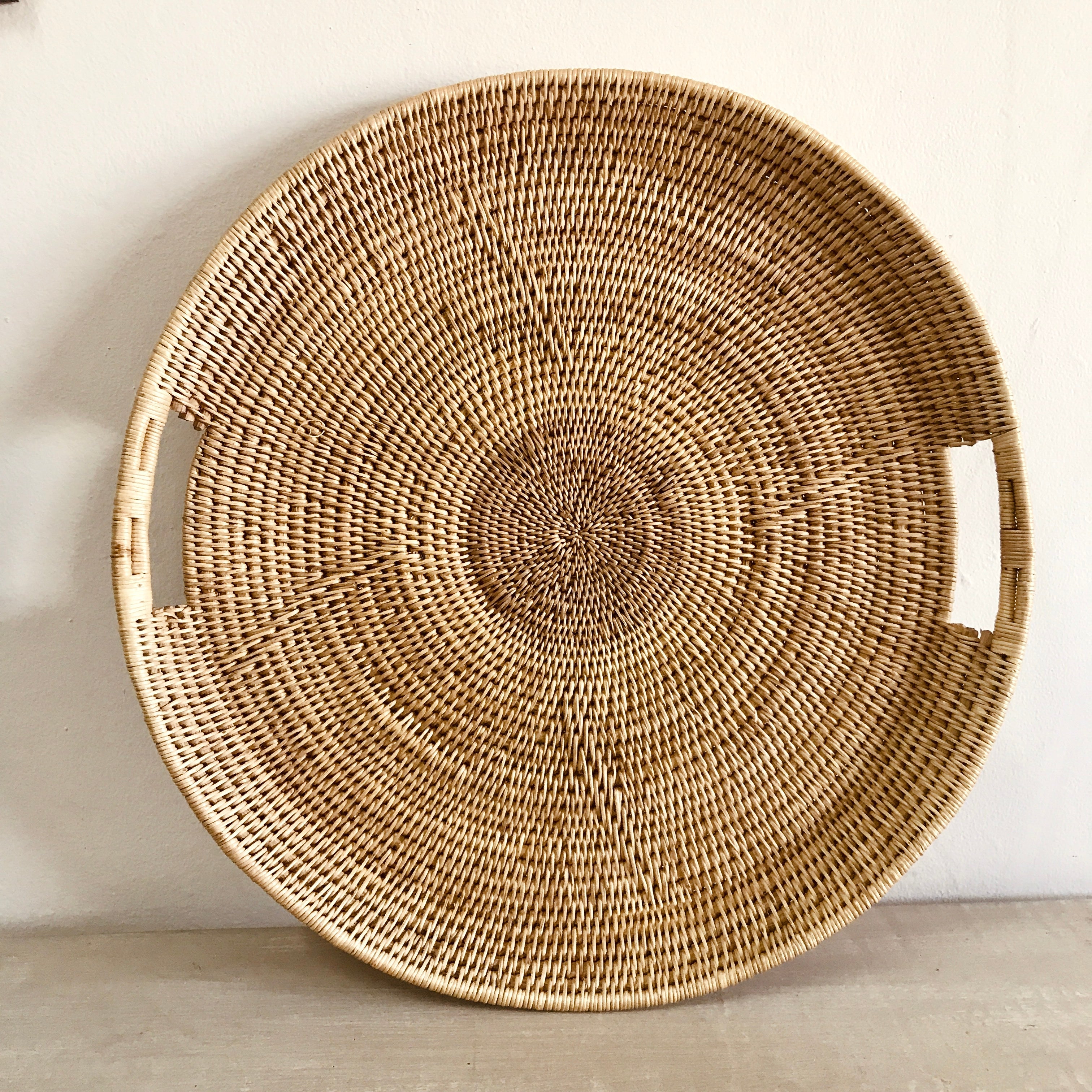Handcrafted extra large statement tray with inbuilt handles, showcasing a beautiful coastal design made from makenge root.