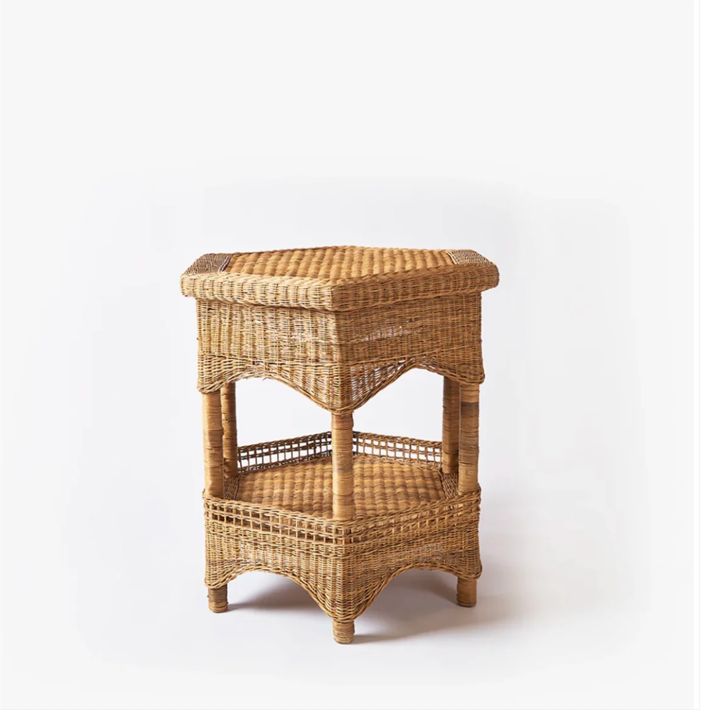 Handwoven rattan hexagon side table ideal for beach days, featuring a bottom shelf and picnic storage capabilities.