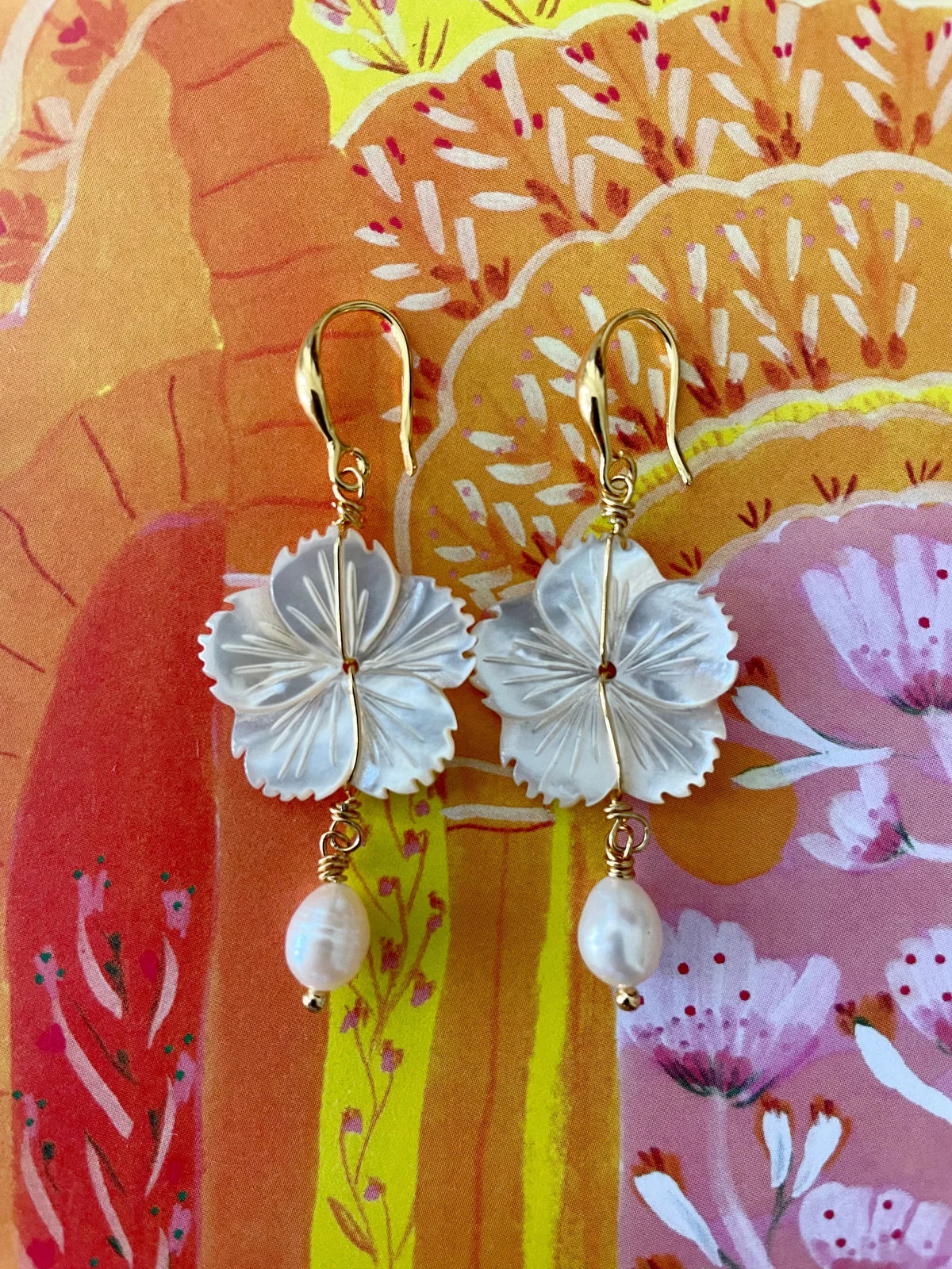Handcrafted Coco Pearl Earrings with mother of pearl flowers and freshwater pearl drops, ocean inspired jewelry.