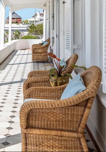 Classic 1-seater Malawi cane chair on a verandah