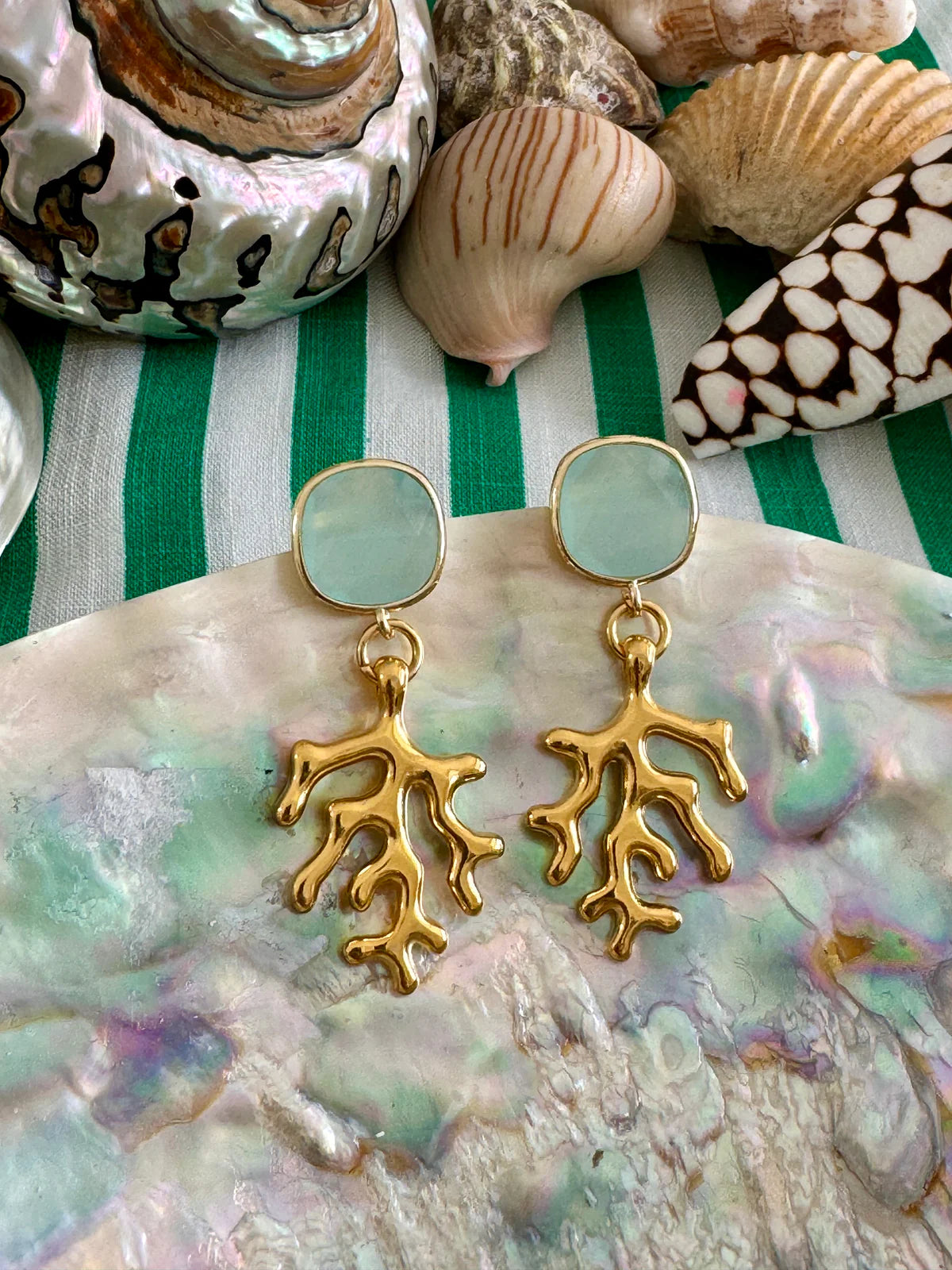Handcrafted ocean-inspired Lampedusa Earrings with aqua stone and gold coral design, perfect for a Mediterranean accent.
