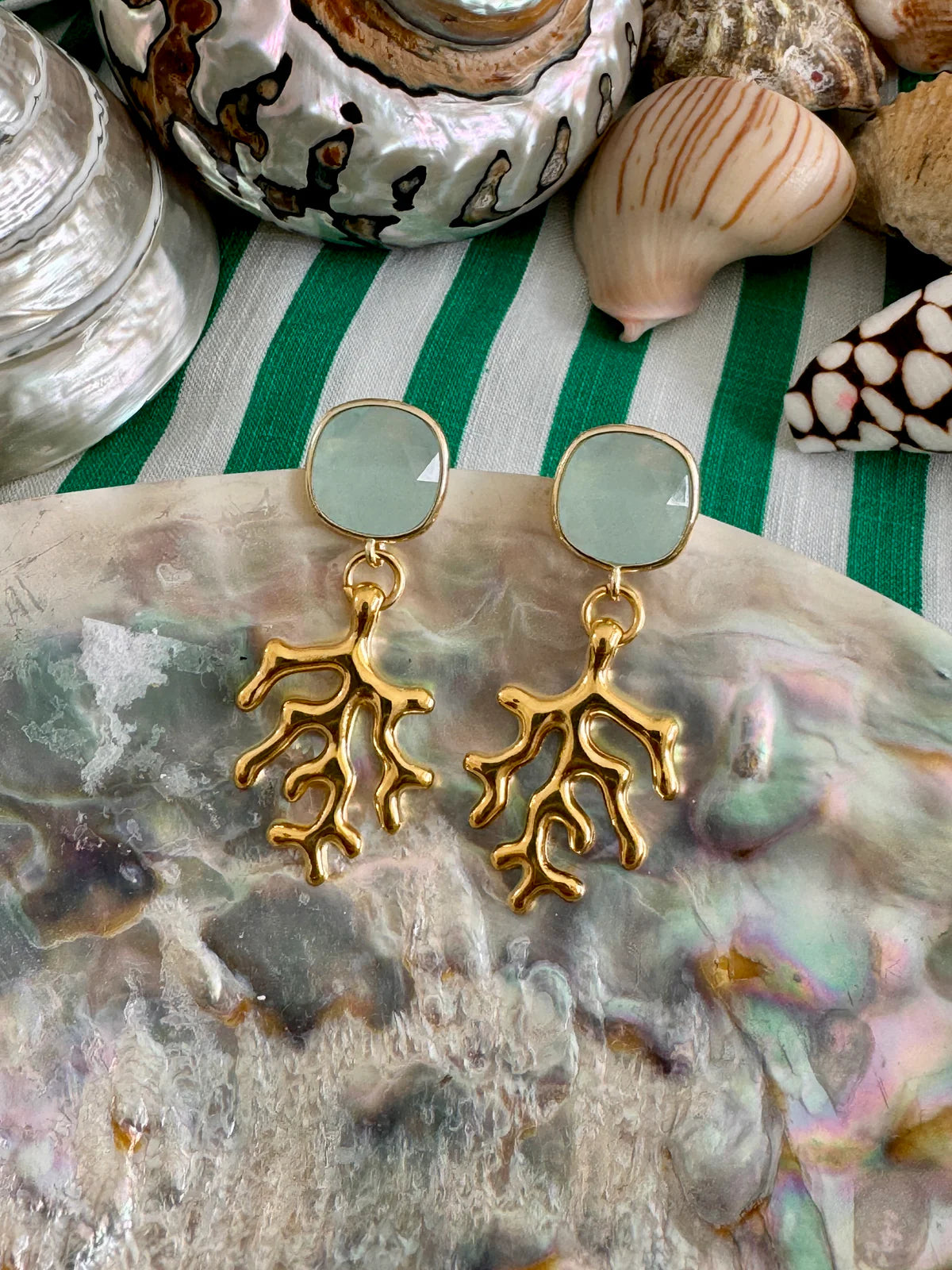 Handcrafted ocean inspired Lampedusa Earrings with gold plated brass and aqua stone, perfect for a Mediterranean accent.