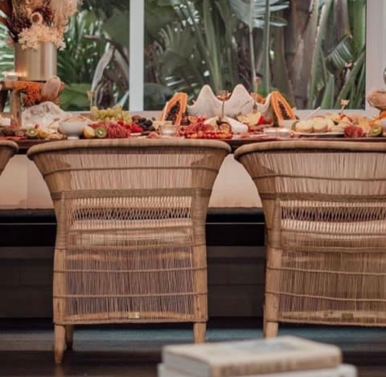 cane Malawi chairs around a dining table