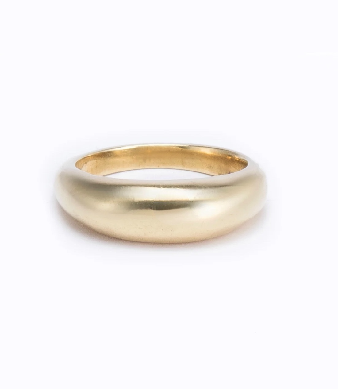 Gold ring on a white background