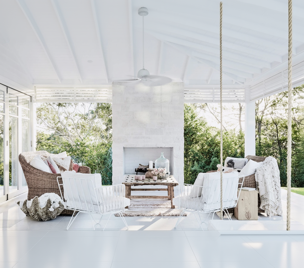 White interior with  Premium 3 seater cane lounger furniture and decor elements