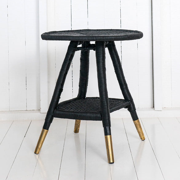 traditional round side table with brass or copper feet black / brass